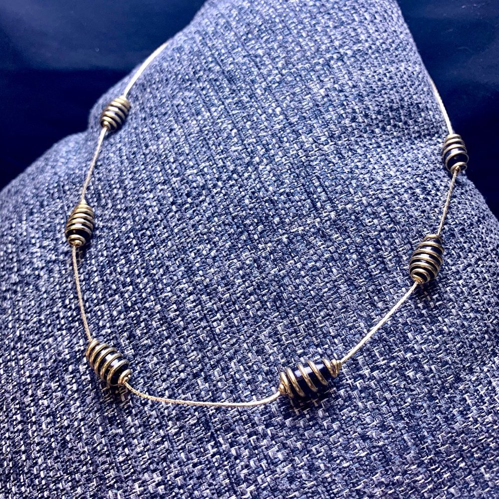 Gold Tone Swirl Pendants Necklace